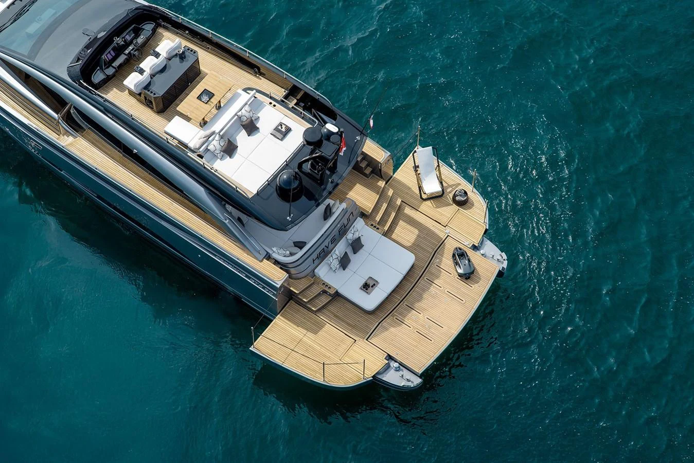 The yacht's aft deck offers a spacious and elegant area for relaxation and entertainment on the water. aboard GTX70 Yacht for Sale