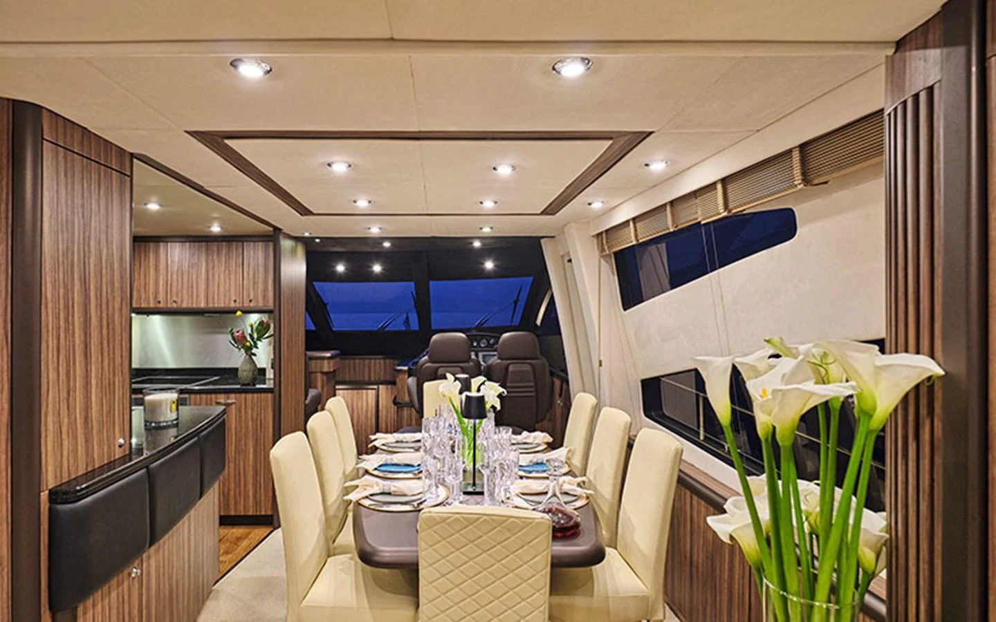 The yacht's dining area features elegant seating and a beautifully set table, perfect for refined dining experiences. aboard M FIVE Yacht for Sale