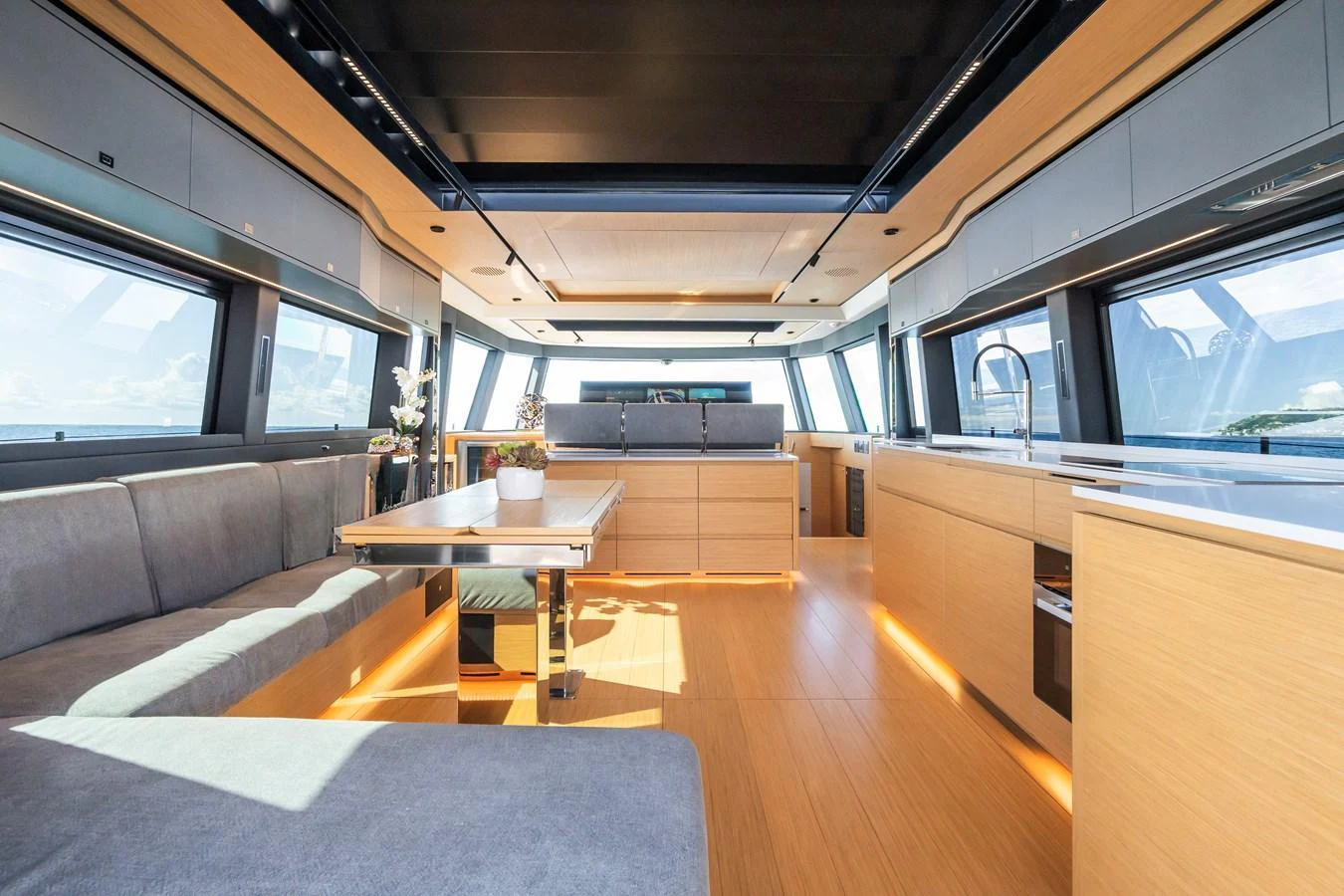 The spacious salon features modern furnishings and ample natural light. aboard SIMON Yacht for Sale