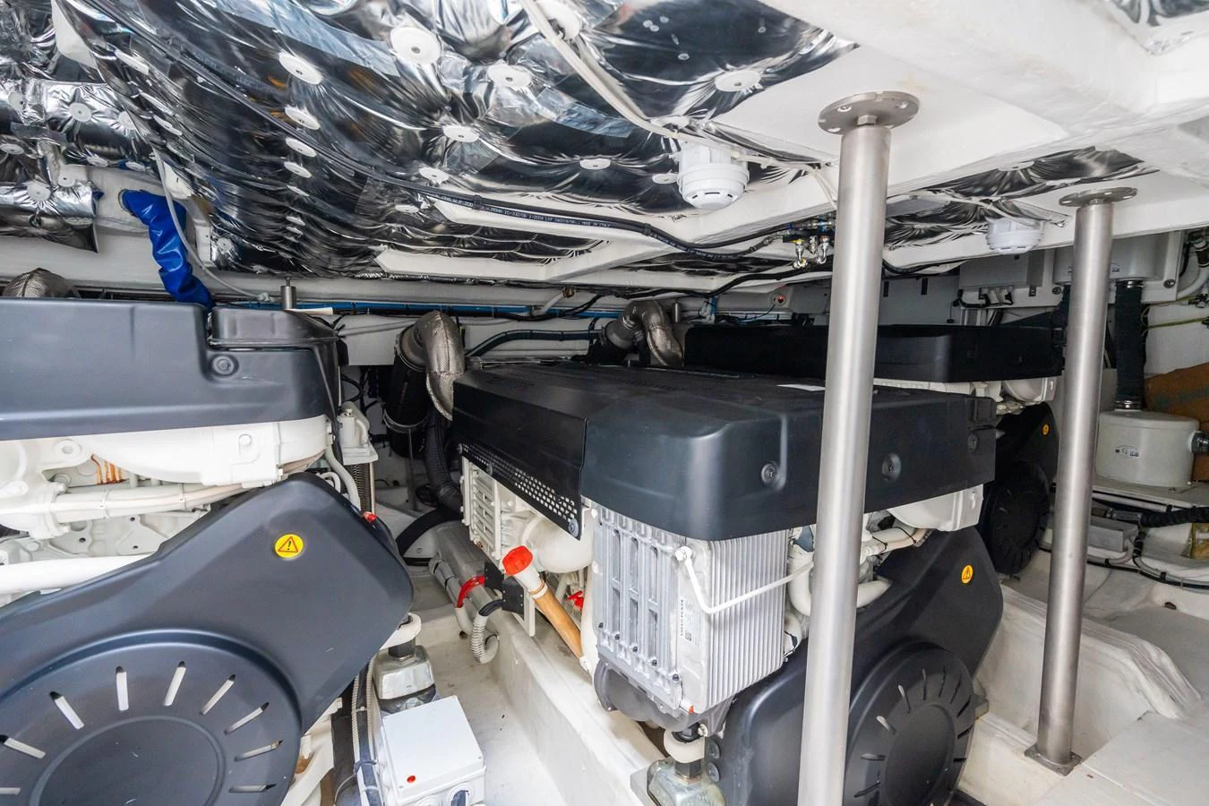 The image showcases the yacht's well-maintained engine room with advanced machinery. aboard SIMON Yacht for Sale