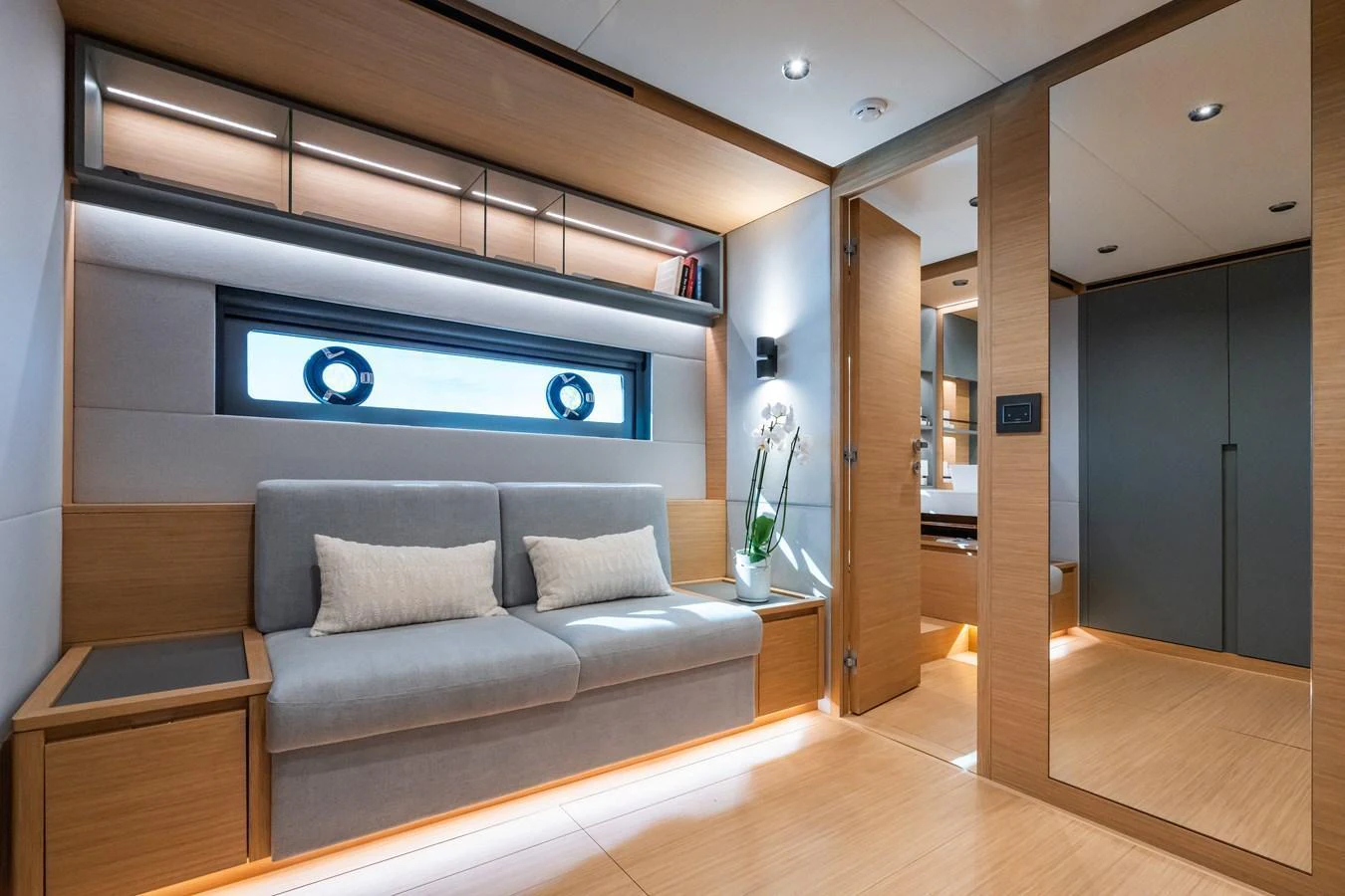 The salon features a modern design with comfortable seating and ample natural light. aboard SIMON Yacht for Sale