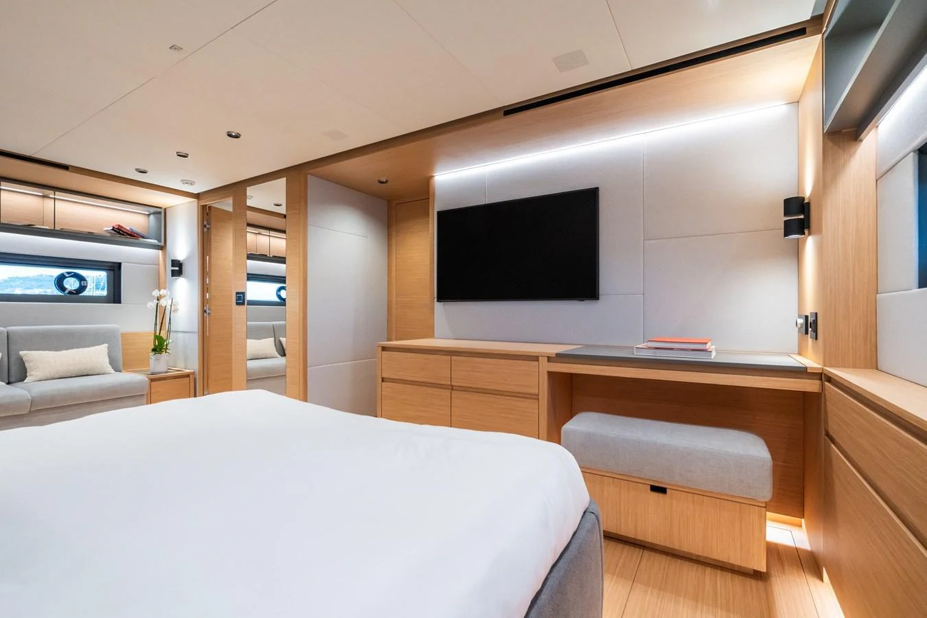 The master stateroom features a modern design with ample natural light and luxurious furnishings. aboard SIMON Yacht for Sale