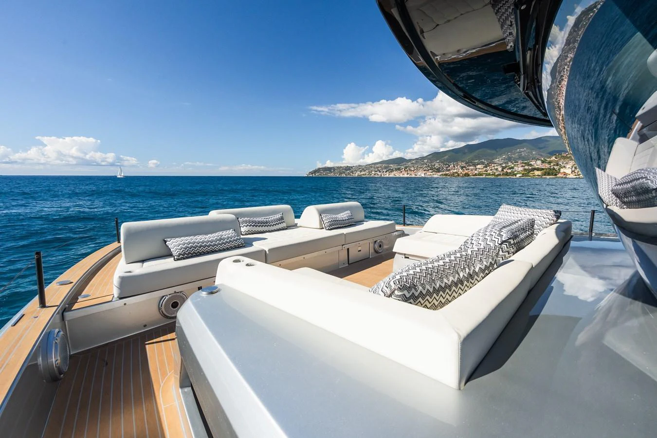 The aft deck offers luxurious sun loungers with stunning ocean views. aboard SIMON Yacht for Sale