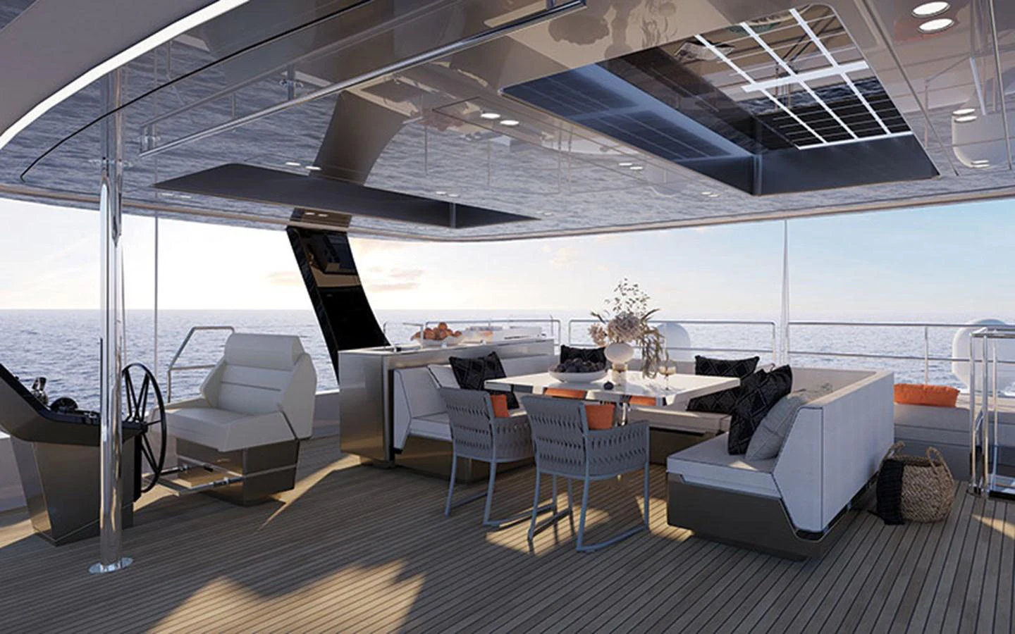 The aft deck features a luxurious seating area with a dining table, perfect for enjoying meals with a view of the sea. aboard THOR Yacht for Sale