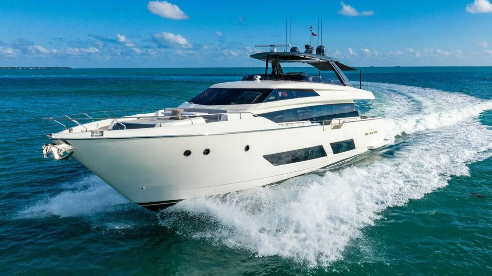 a white yacht on the water aboard 85 FERRETTI Yacht for Sale
