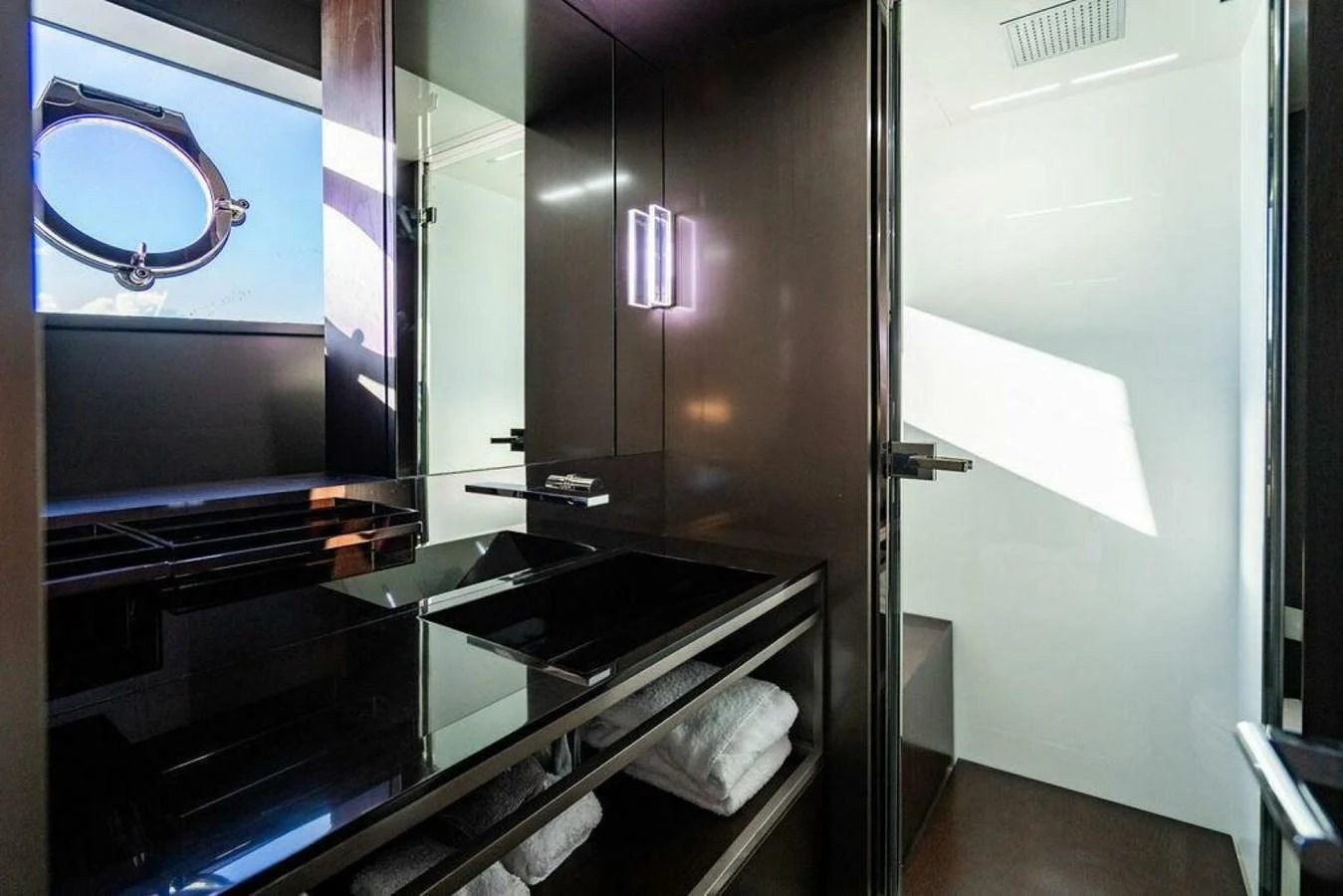 a kitchen with a large mirror aboard 85 FERRETTI Yacht for Sale