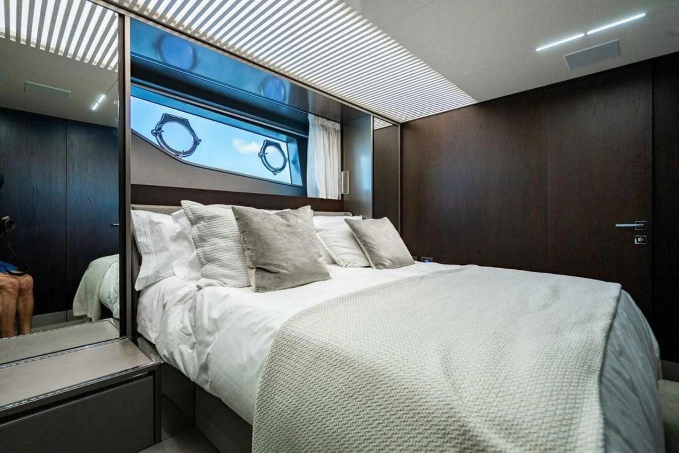 a bed with white sheets aboard 85 FERRETTI Yacht for Sale