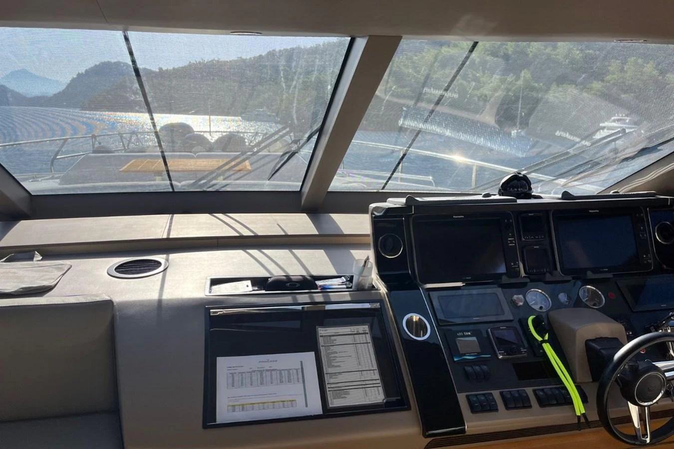 The helm station offers a commanding view with advanced navigation equipment and luxurious finishes. aboard MS FELICE Yacht for Sale