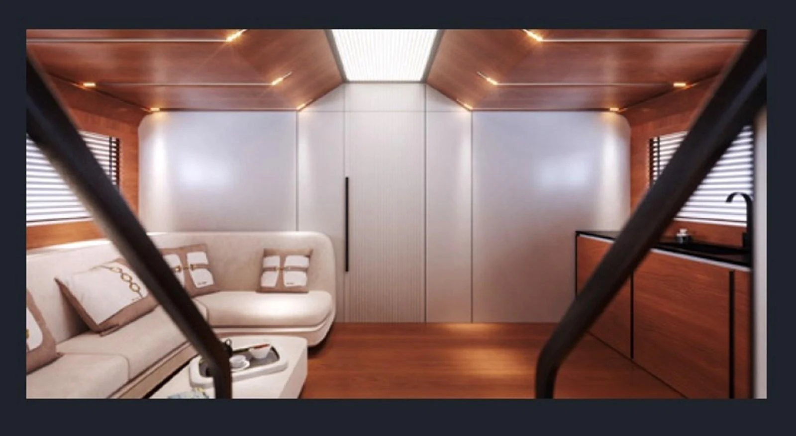 The yacht's interior features a cozy lounge area with a modern design and warm wooden accents. aboard OTTANTA VELOCE Yacht for Sale