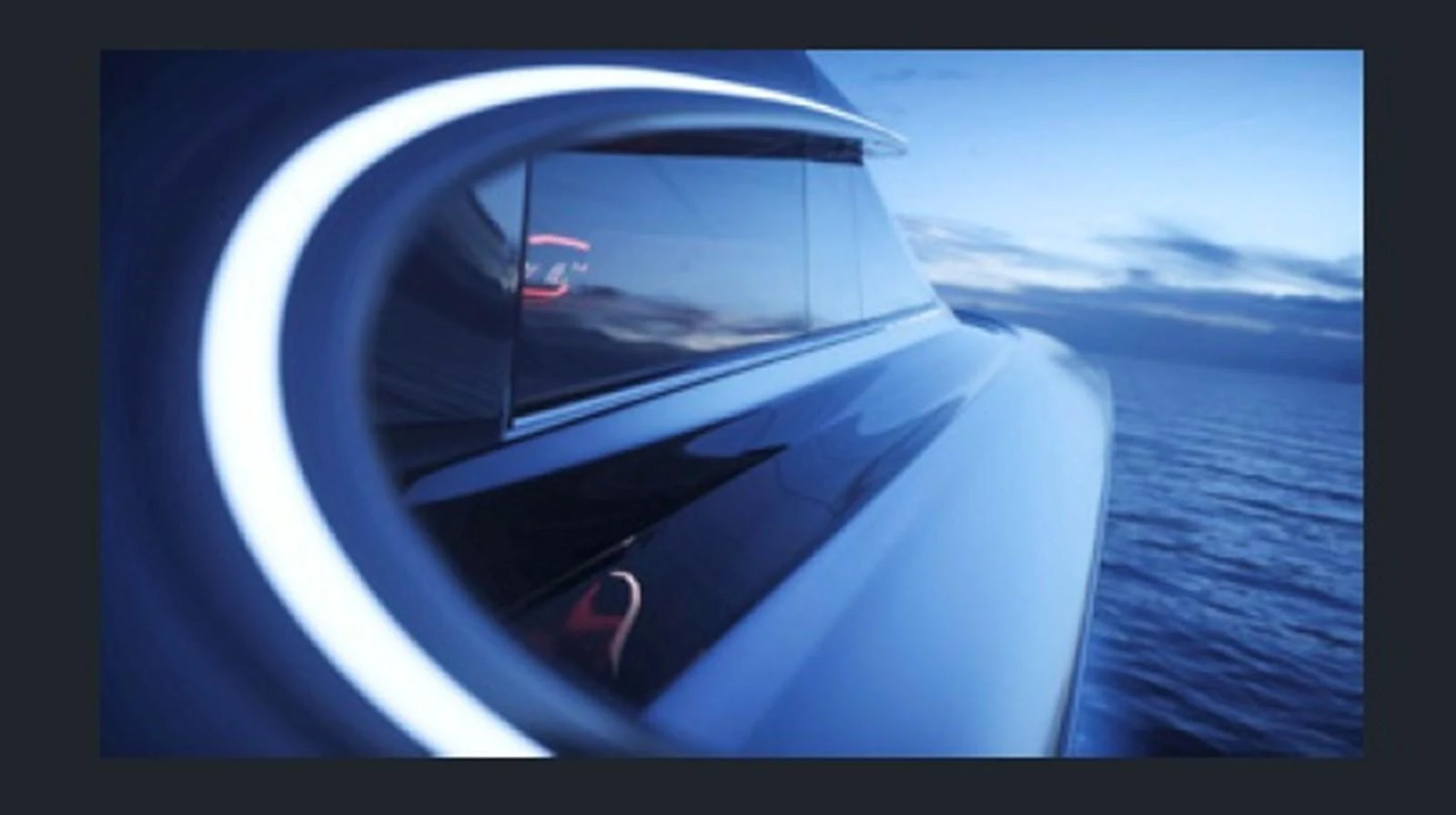 A sleek and modern yacht detail shot highlighting its futuristic design against a serene ocean backdrop. aboard OTTANTA VELOCE Yacht for Sale