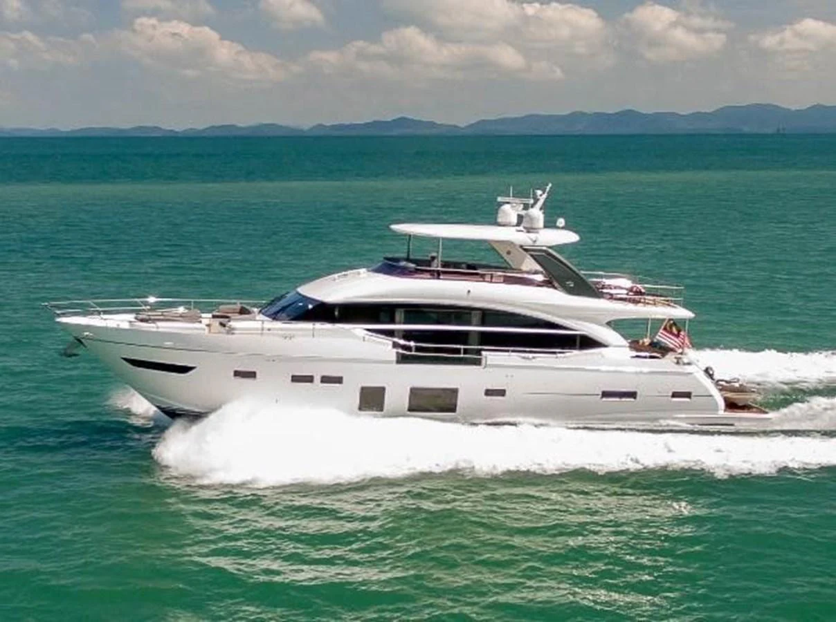 A sleek and modern yacht cruises swiftly through the open sea, showcasing its elegant design and luxurious amenities. aboard ANDAMAN PRINCESS Yacht for Sale