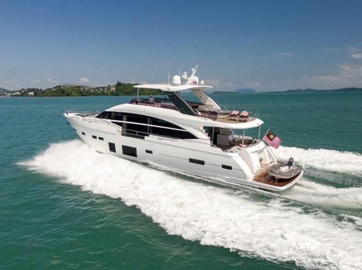 A sleek and modern yacht cruises swiftly through clear blue waters, showcasing its elegant design and luxurious amenities. aboard ANDAMAN PRINCESS Yacht for Sale