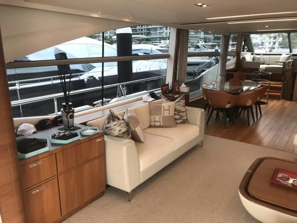 The yacht's salon offers a luxurious and comfortable seating area with ample natural light and elegant decor. aboard ANDAMAN PRINCESS Yacht for Sale