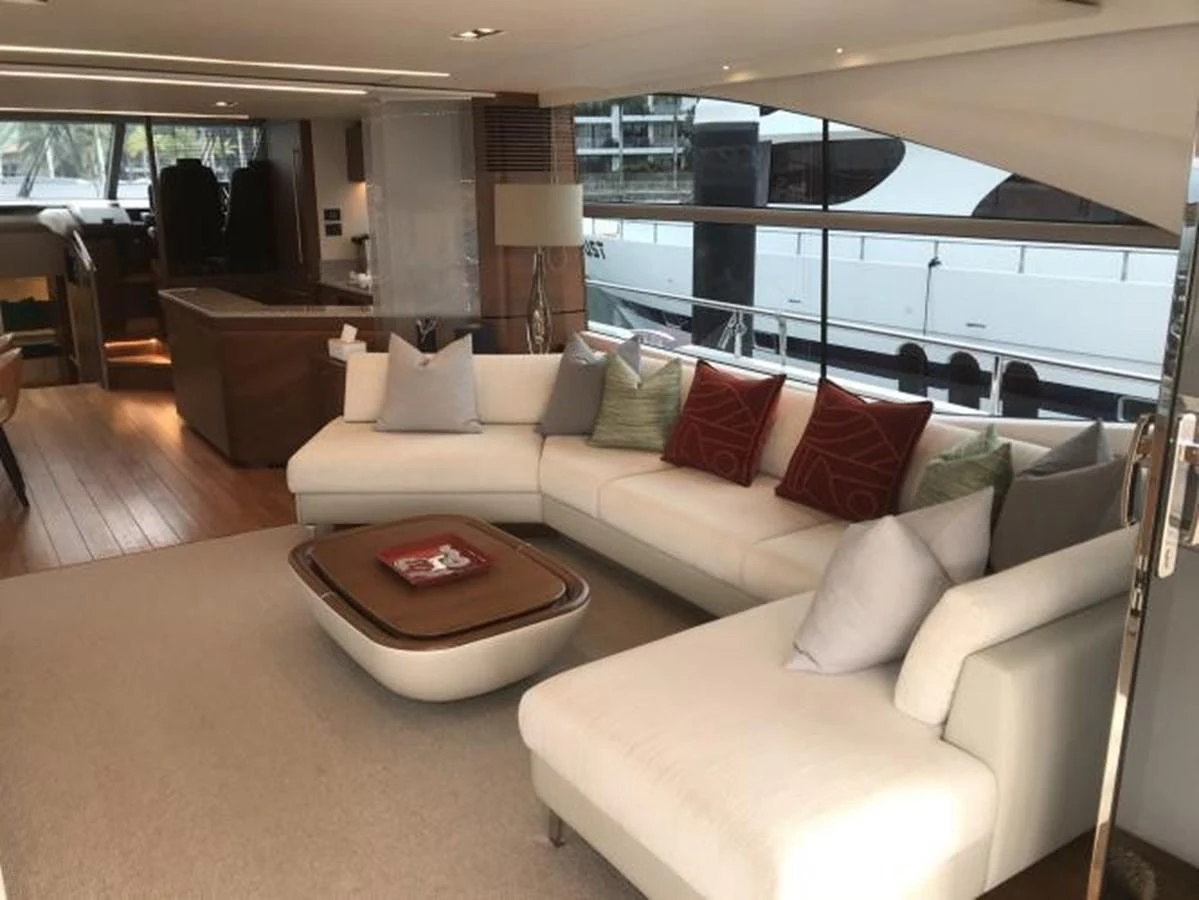 The salon features a spacious and elegant seating area with modern furnishings and ample natural light. aboard ANDAMAN PRINCESS Yacht for Sale