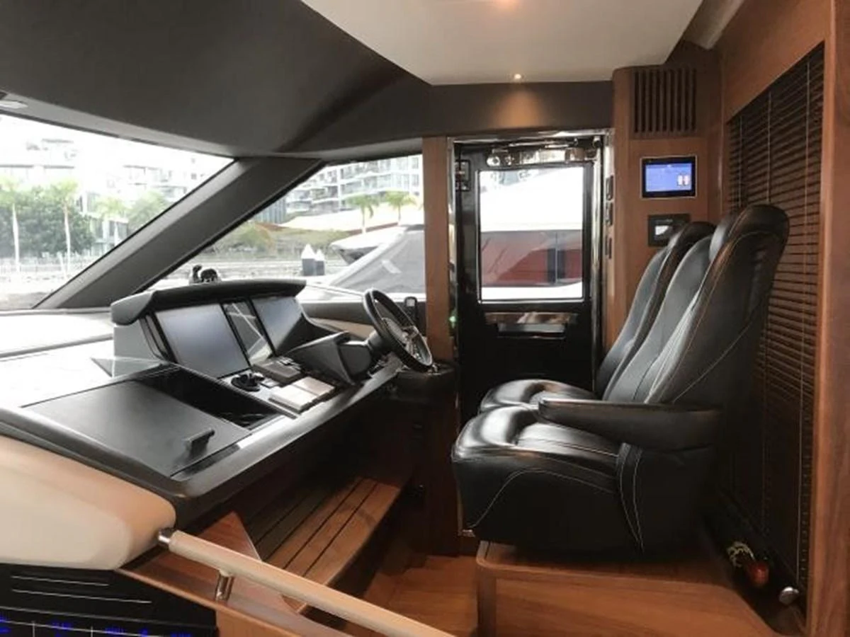 The helm station features luxurious seating and state-of-the-art navigation equipment. aboard ANDAMAN PRINCESS Yacht for Sale