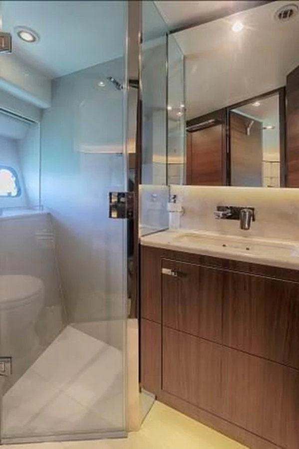 The yacht's bathroom features modern fixtures and a sleek design with a glass-enclosed shower. aboard ANDAMAN PRINCESS Yacht for Sale
