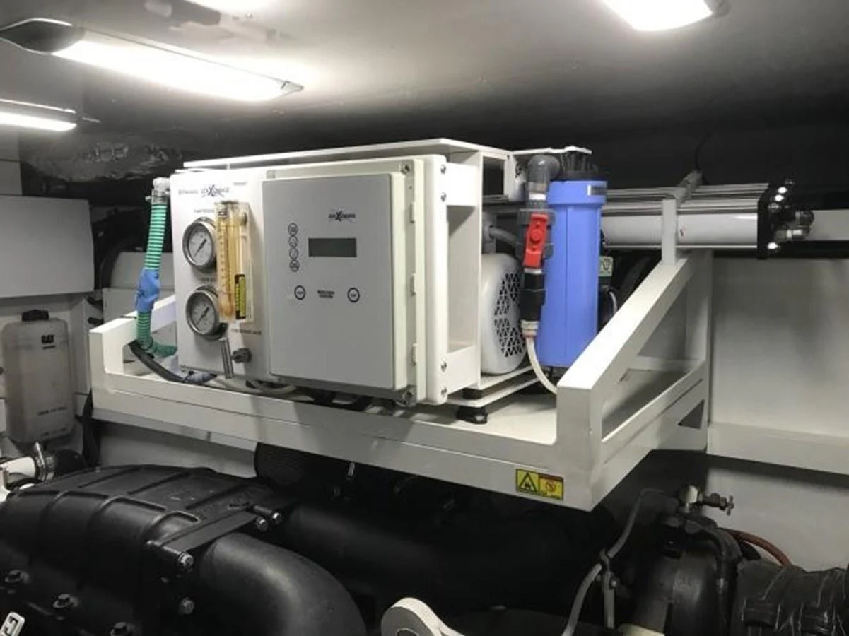 The image shows a detailed view of the yacht's engine room with various technical equipment. aboard ANDAMAN PRINCESS Yacht for Sale