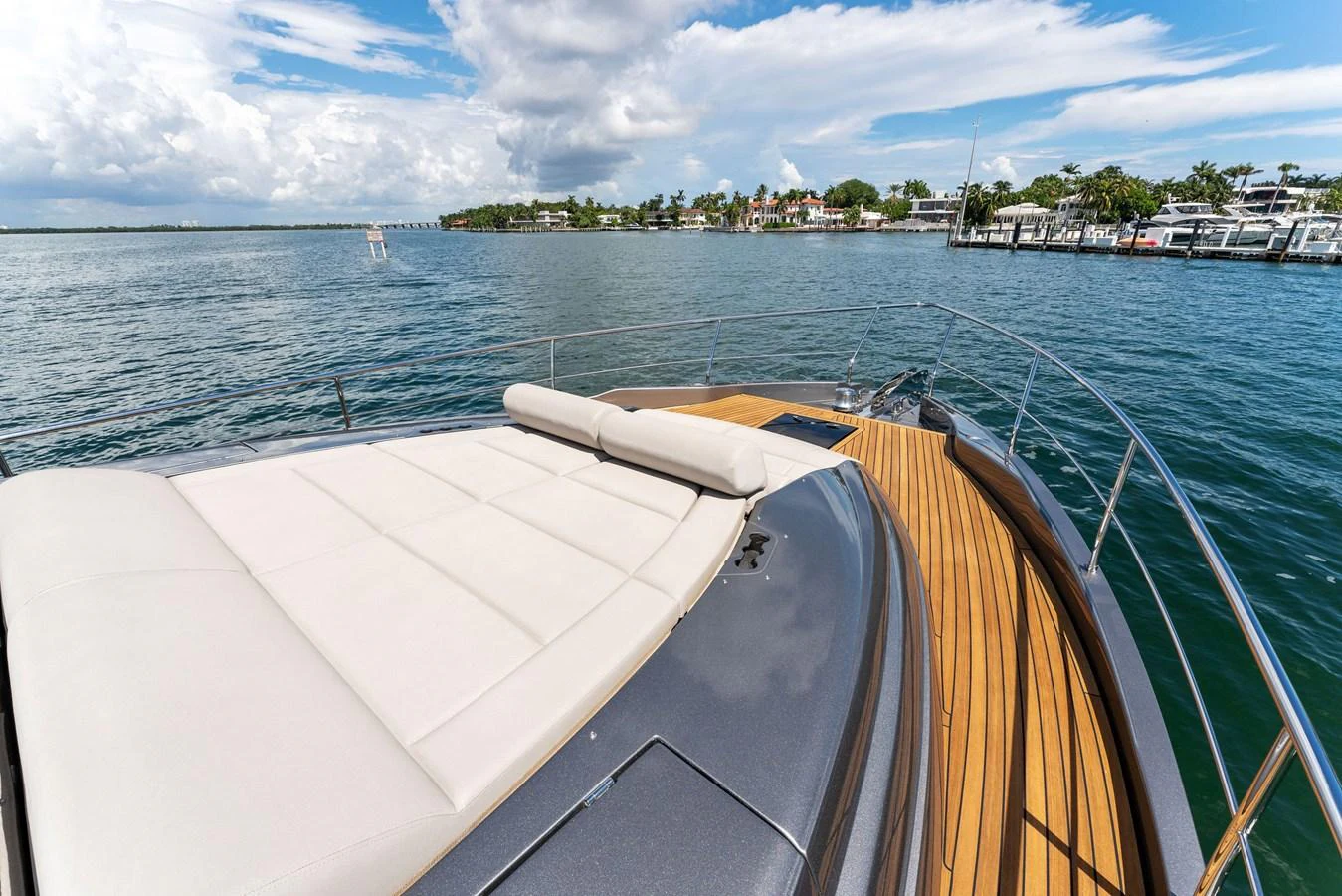 The yacht's foredeck features a spacious sunpad with stunning views of the surrounding waters. aboard QUANTUM Yacht for Sale