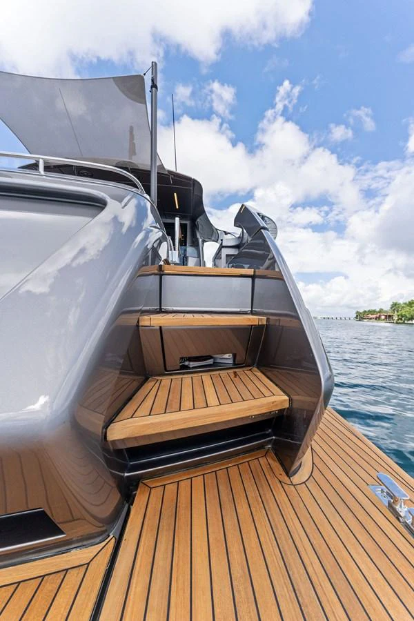 A close-up view of the yacht's sleek wooden steps leading to the upper deck. aboard QUANTUM Yacht for Sale