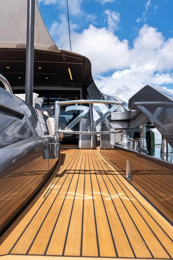 The aft deck features sleek design elements and a spacious layout for relaxation. aboard QUANTUM Yacht for Sale