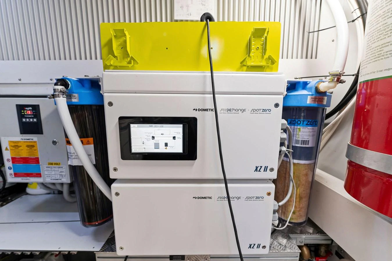 The image showcases the yacht's advanced water filtration system in the engine room. aboard QUANTUM Yacht for Sale