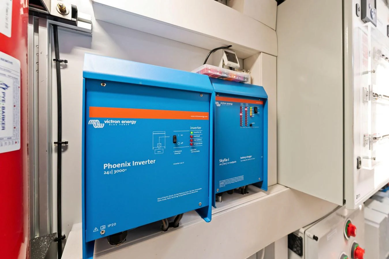 The image showcases the yacht's electrical system with Victron Energy inverters. aboard QUANTUM Yacht for Sale