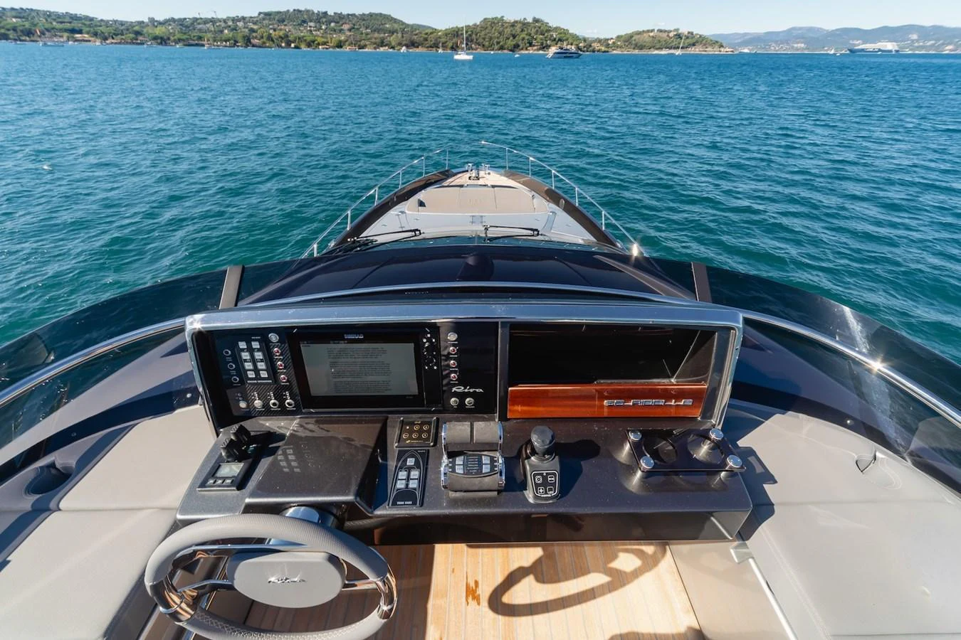 The helm station offers a commanding view of the serene waters ahead. aboard AMELIA Yacht for Sale