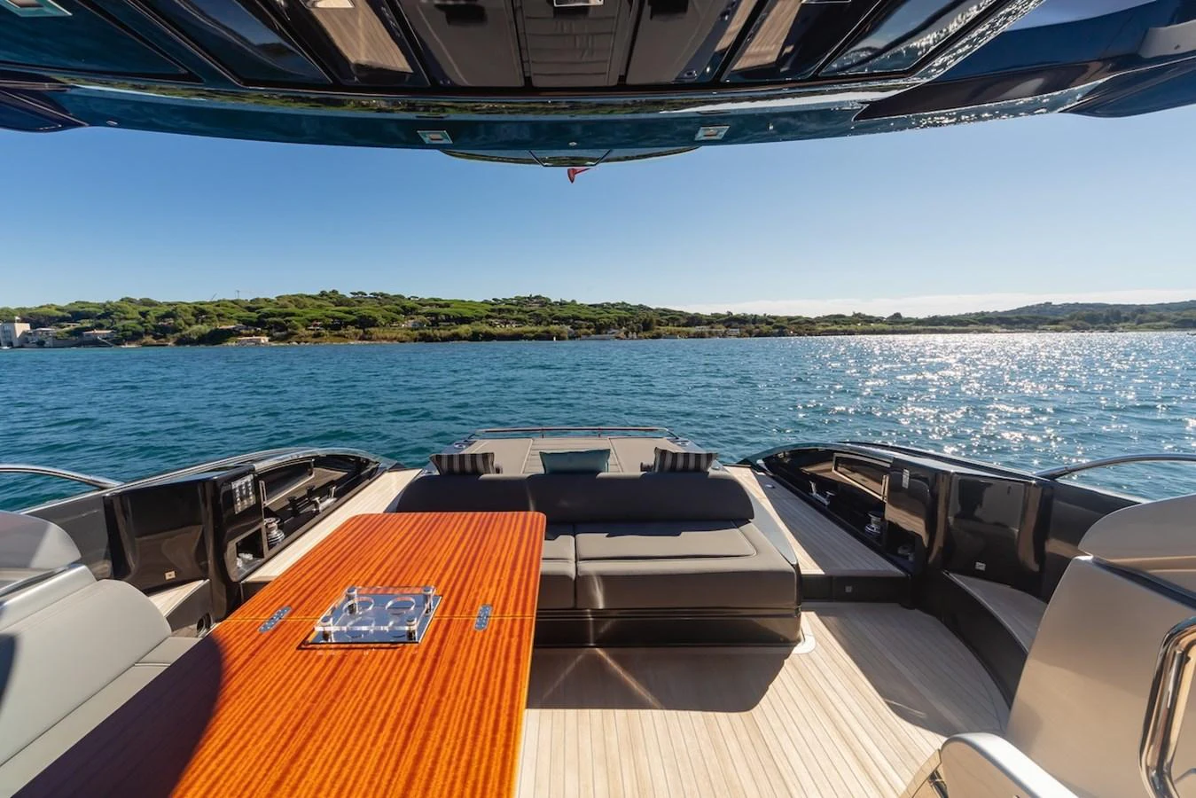 The aft deck offers a luxurious space for relaxation and dining with stunning views of the water. aboard AMELIA Yacht for Sale