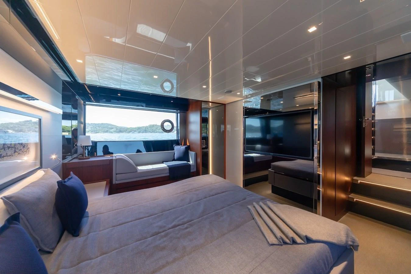 The master stateroom offers a luxurious and spacious retreat with stunning views through large windows. aboard AMELIA Yacht for Sale