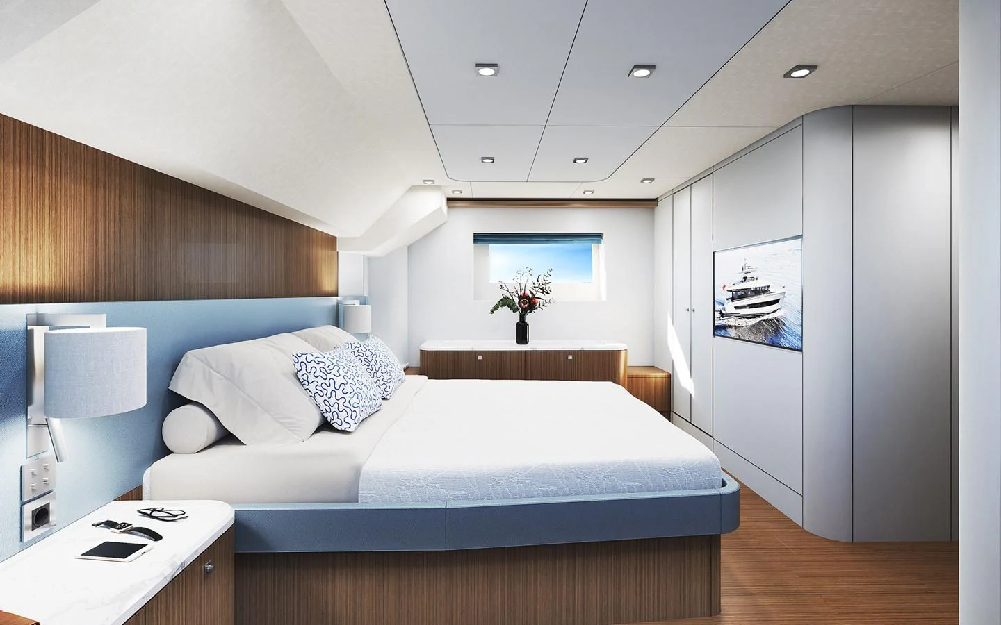 The stateroom features a luxurious bed, modern decor, and ample natural light. aboard TBD Yacht for Sale