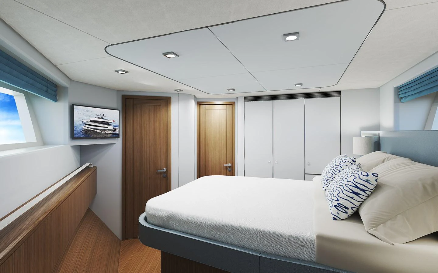 The stateroom features a comfortable bed, modern decor, and ample natural light. aboard TBD Yacht for Sale