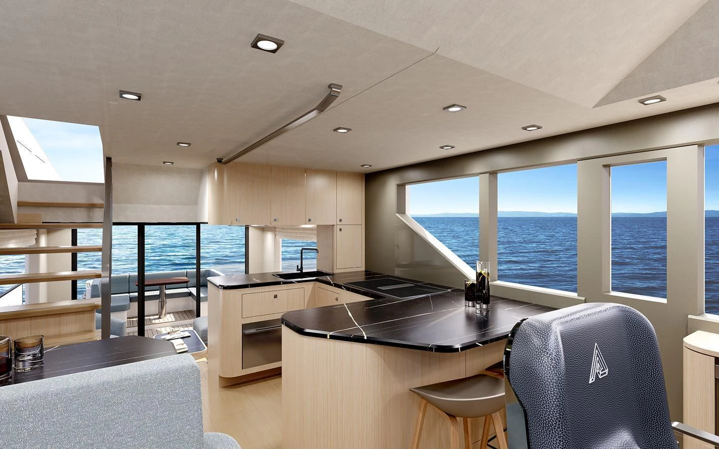 The yacht's galley features modern appliances and panoramic ocean views. aboard TBD Yacht for Sale