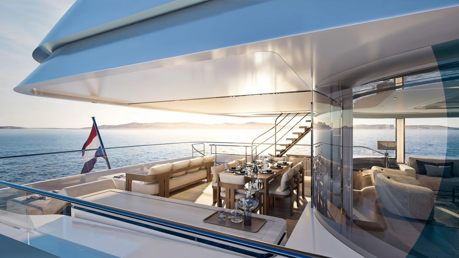 The aft deck features a luxurious dining area with panoramic ocean views. aboard 133 MALLORCA Yacht for Sale