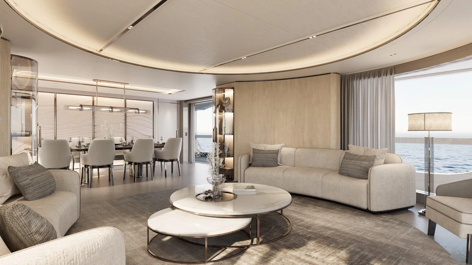 The yacht's salon features elegant, modern furnishings with ample seating and a dining area, all bathed in natural light from large windows. aboard 133 MALLORCA Yacht for Sale