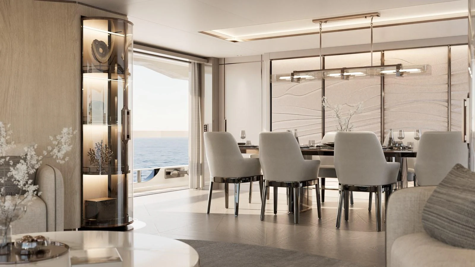 The yacht's dining area features elegant seating and a sophisticated ambiance with a view of the sea. aboard 133 MALLORCA Yacht for Sale