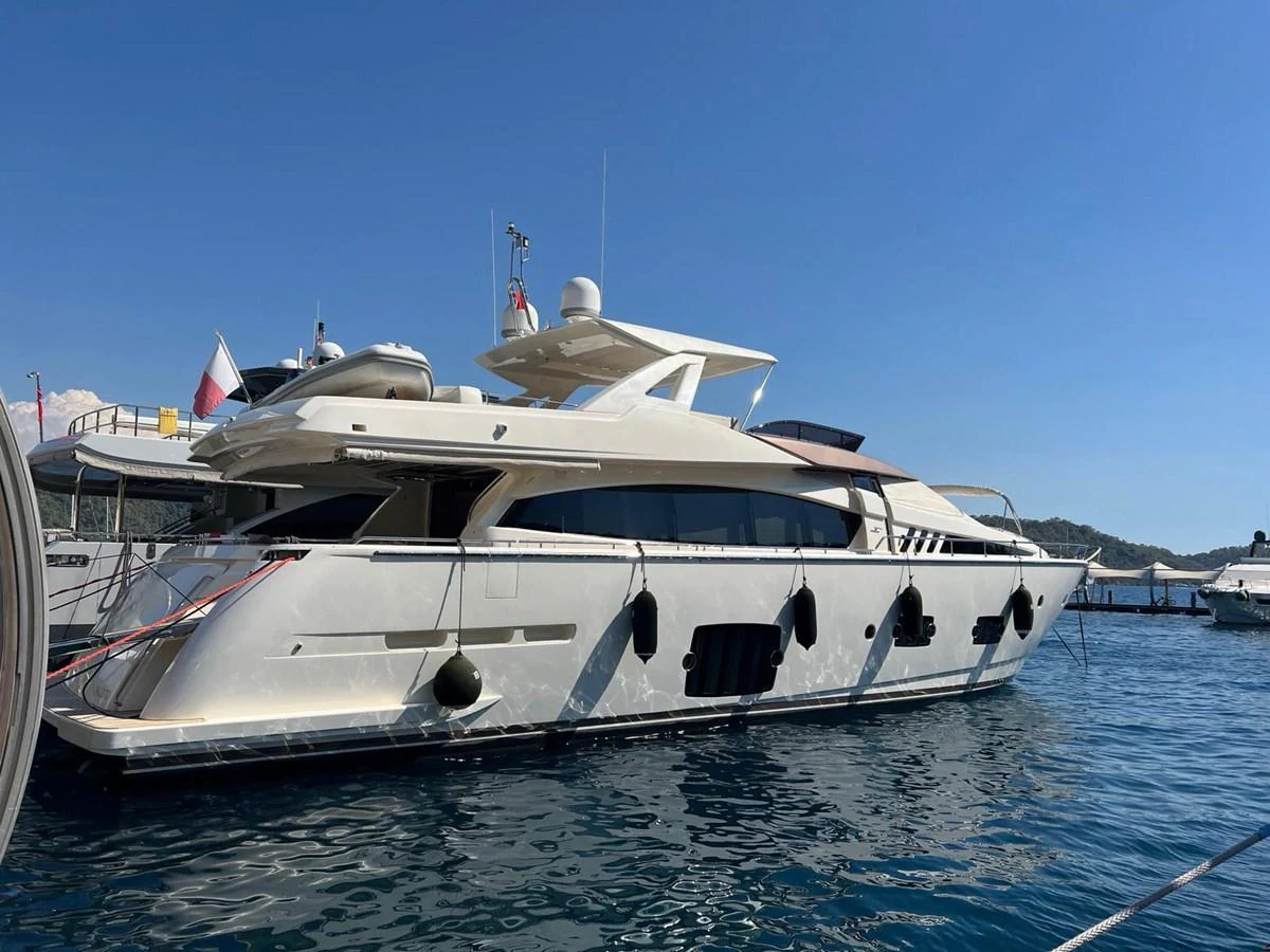 a white yacht in the water aboard NGV Yacht for Sale