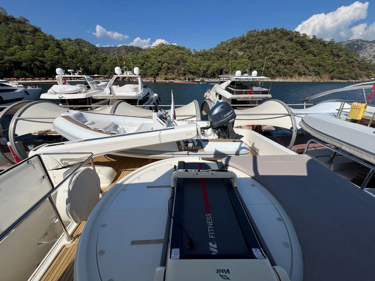a group of boats are parked in a harbor aboard NGV Yacht for Sale