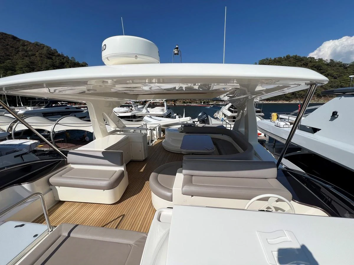 a row of boats on a dock aboard NGV Yacht for Sale