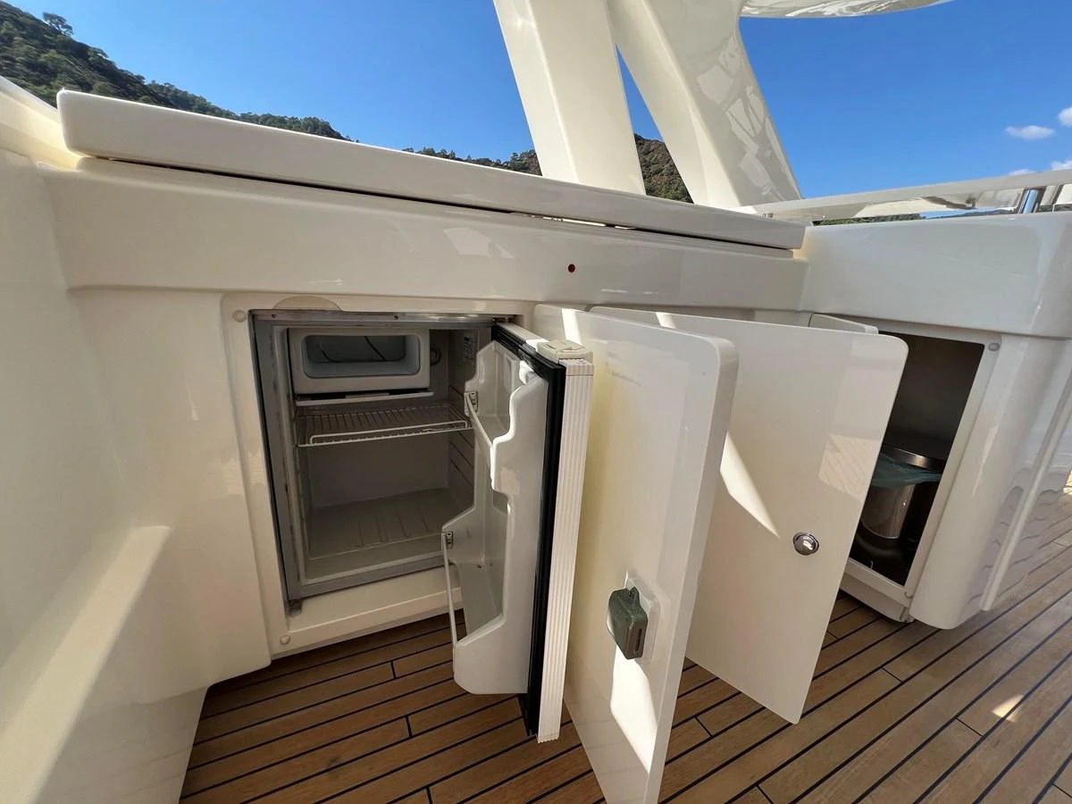 a large white building with a large balcony aboard NGV Yacht for Sale