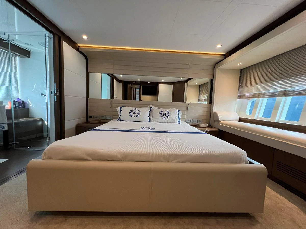 a bed in a room aboard NGV Yacht for Sale