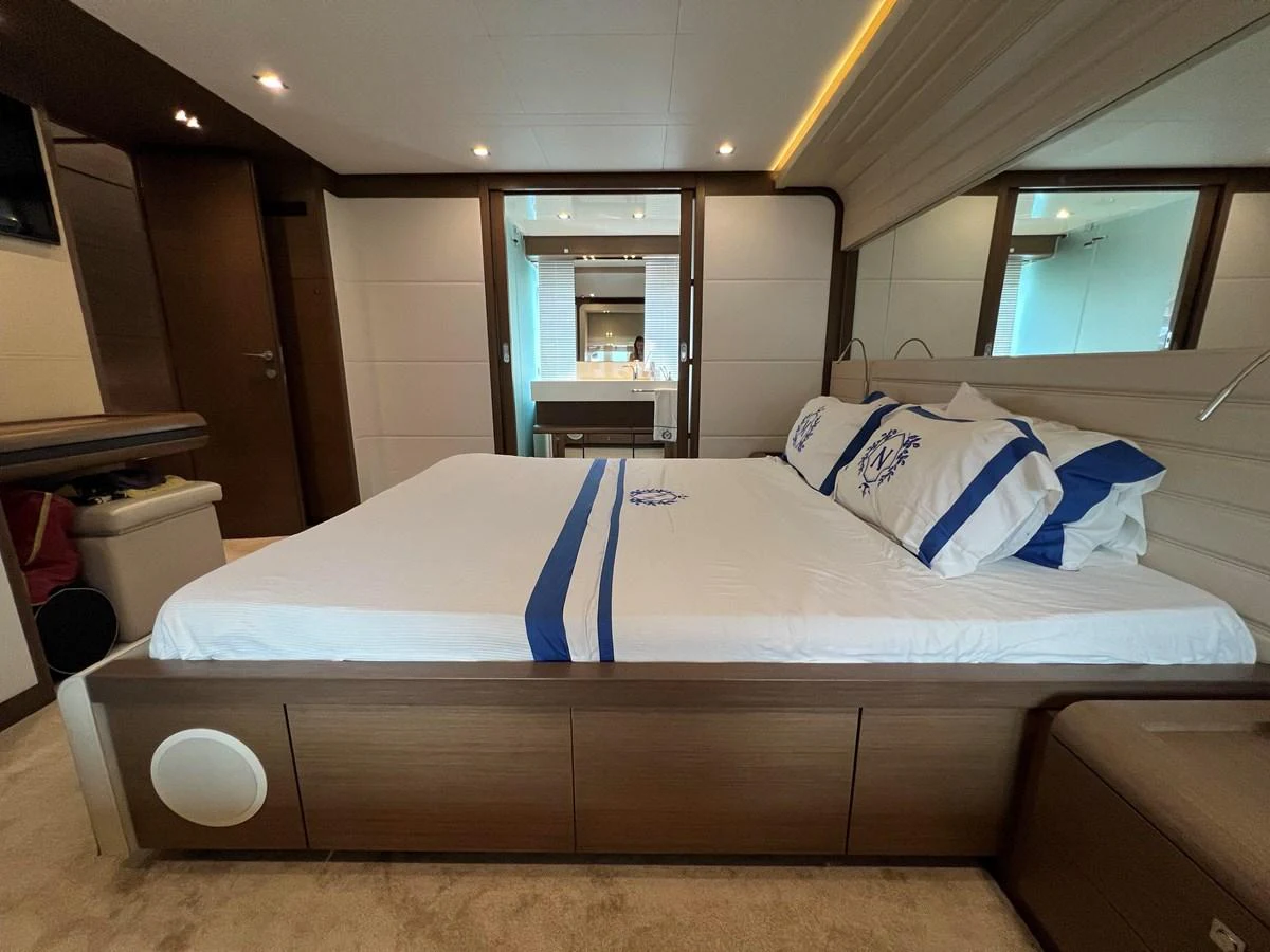 a bed in a room aboard NGV Yacht for Sale