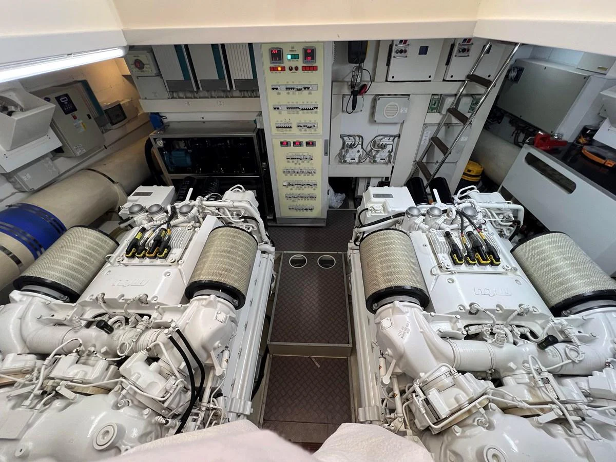 a room with several machines aboard NGV Yacht for Sale