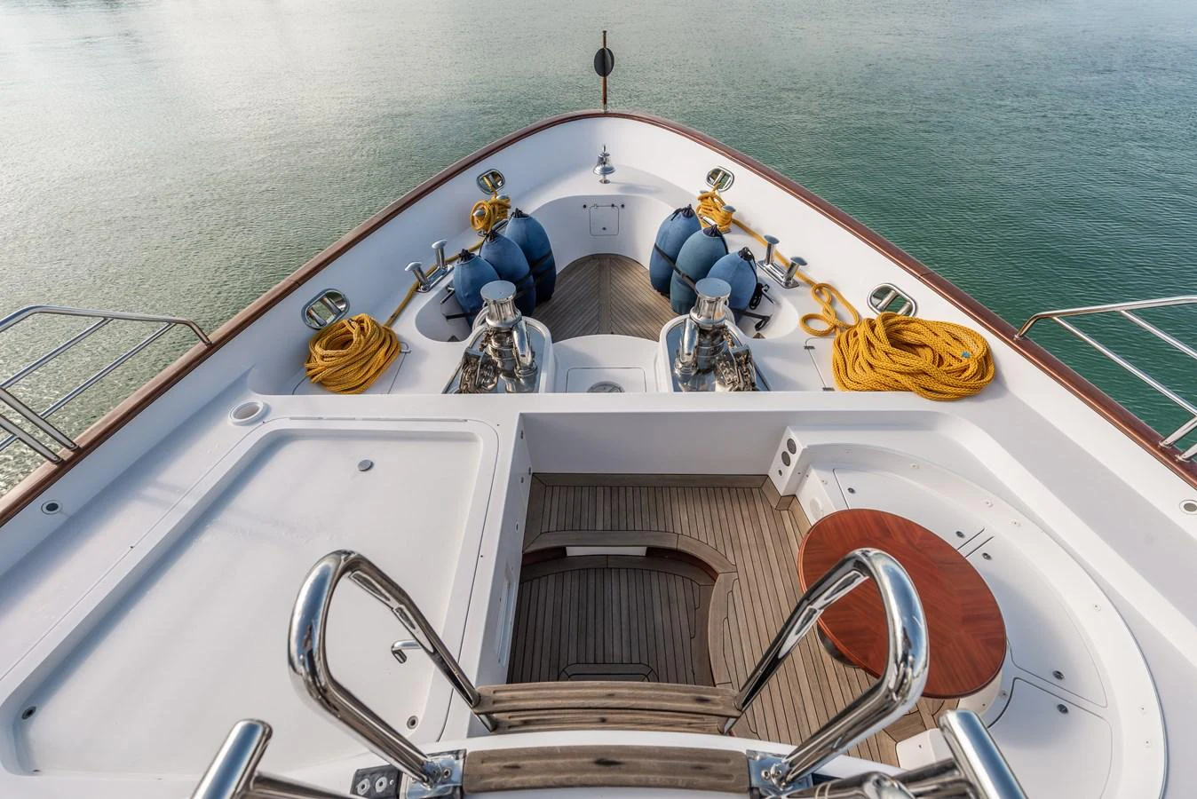 The bow of the yacht features well-organized anchor equipment and a clean deck layout. aboard MY SISA Yacht for Sale