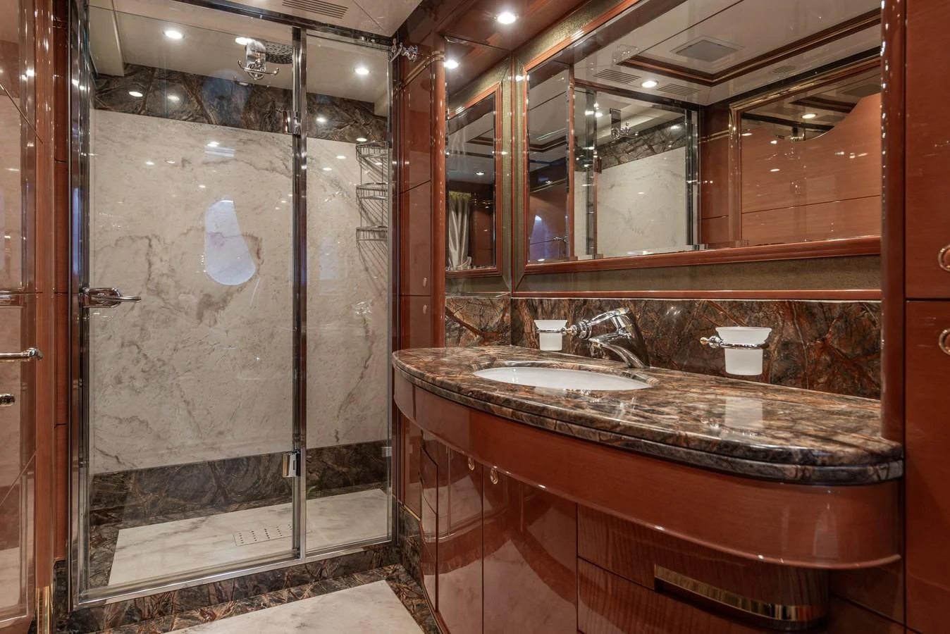 The yacht's bathroom features luxurious marble finishes and elegant fixtures. aboard MY SISA Yacht for Sale