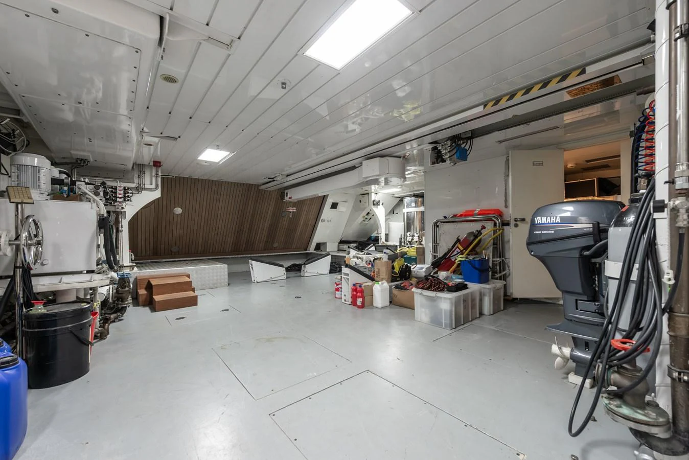 A spacious and functional storage area within the yacht, equipped with various tools and equipment. aboard MY SISA Yacht for Sale