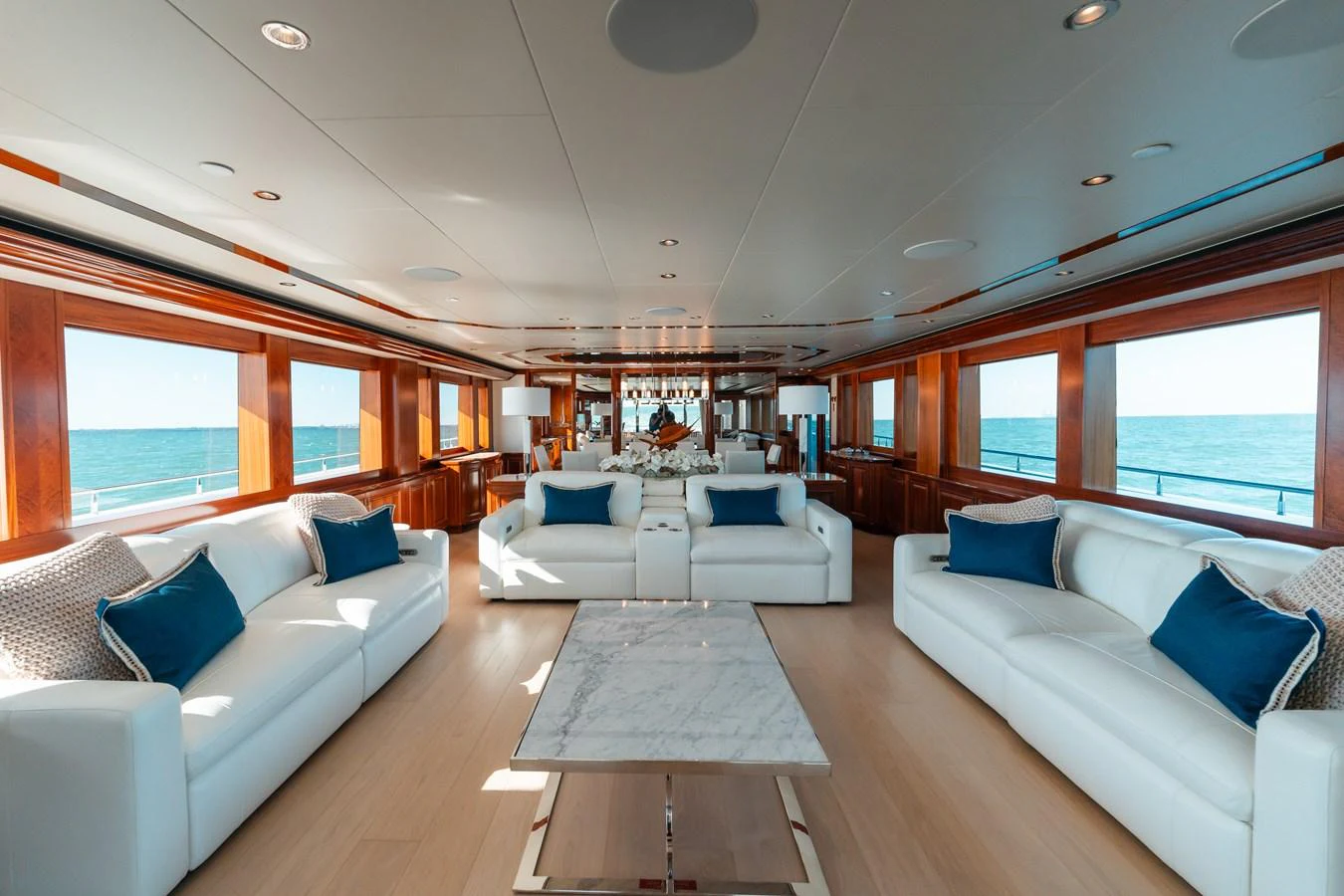 a large living room with a large open window aboard BLUE TIME Yacht for Sale