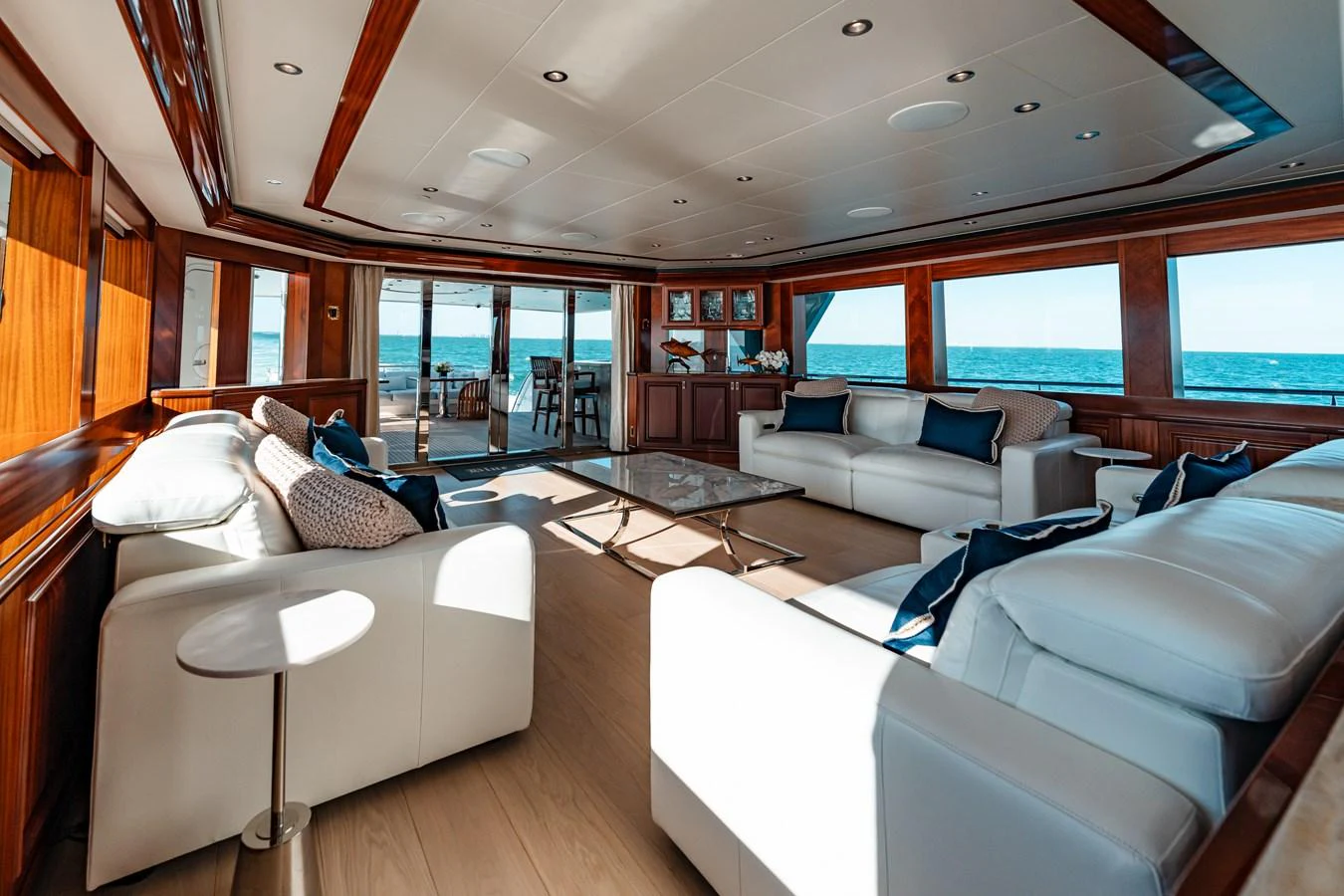 a living room with a large window aboard BLUE TIME Yacht for Sale