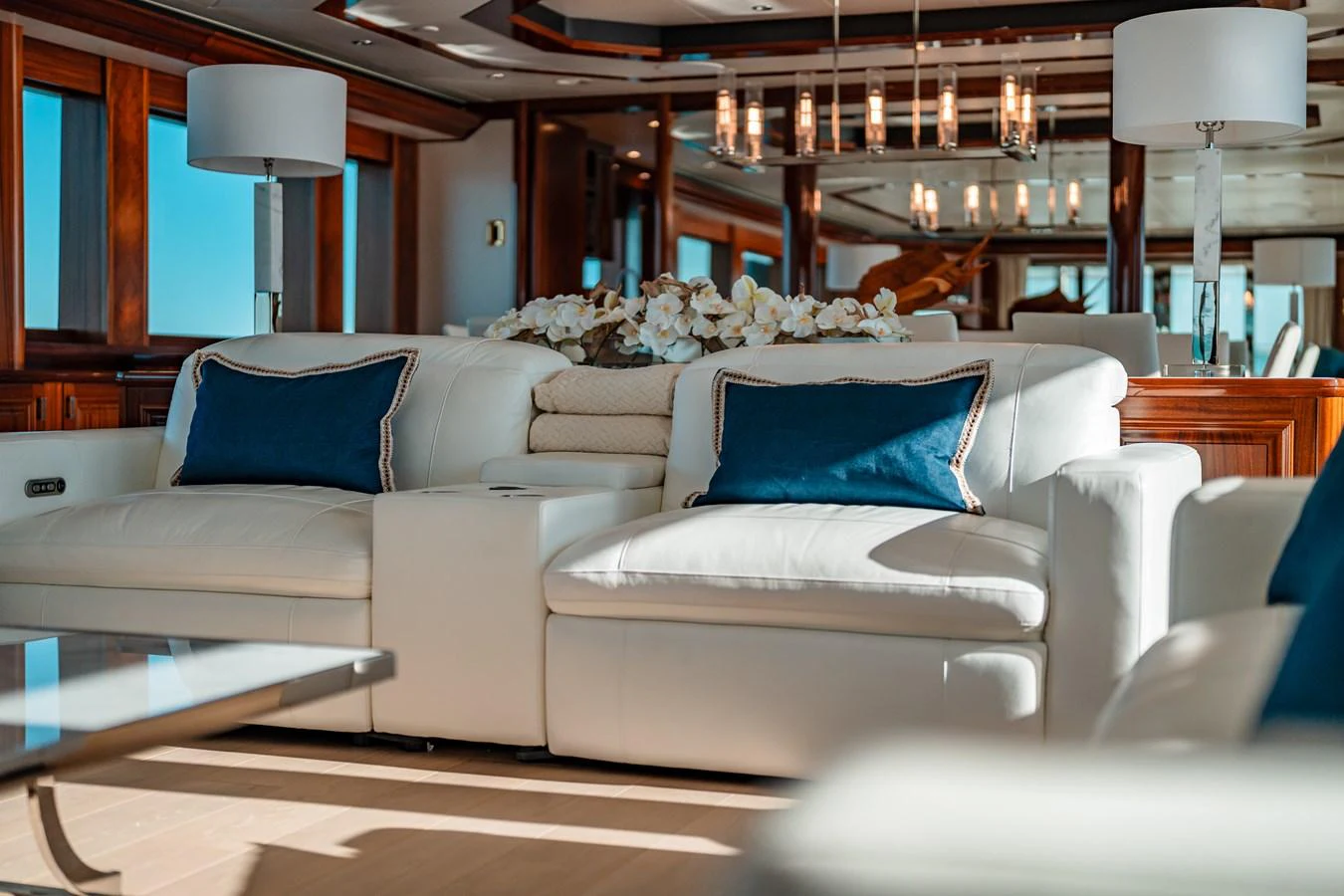 a living room with a couch aboard BLUE TIME Yacht for Sale