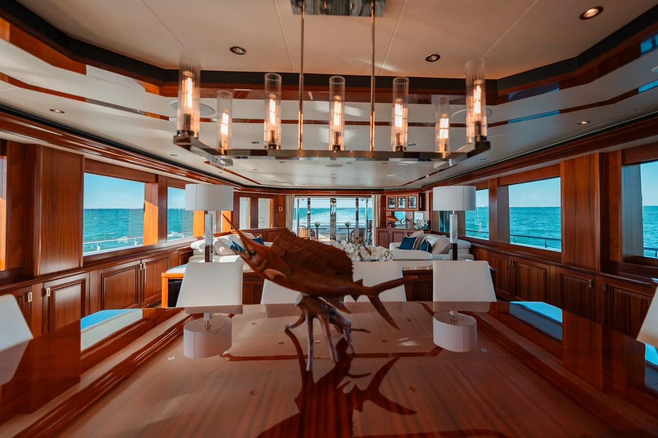 a room with a large chandelier and a large mirror aboard BLUE TIME Yacht for Sale