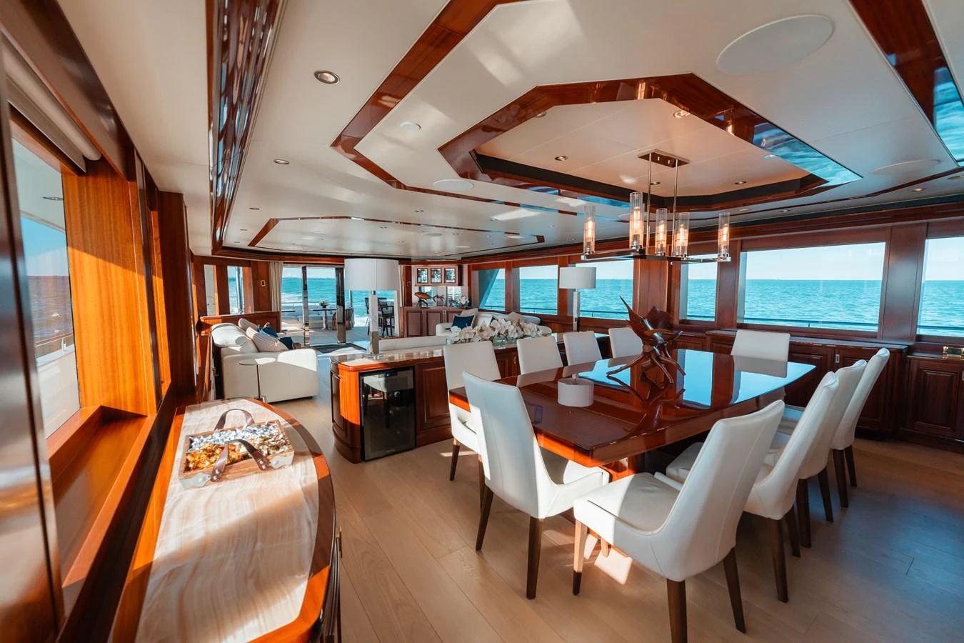 a room with a table and chairs aboard BLUE TIME Yacht for Sale
